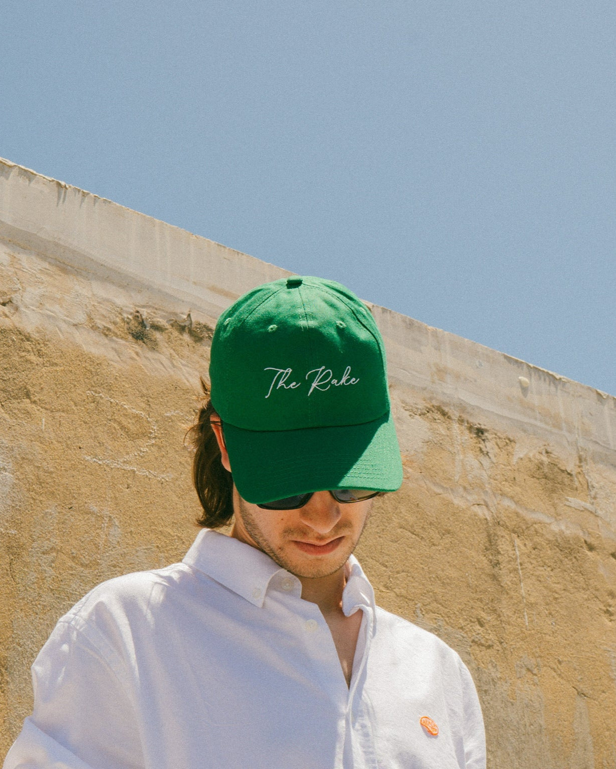 The Rake Logo Dad Cap in Bright Green
