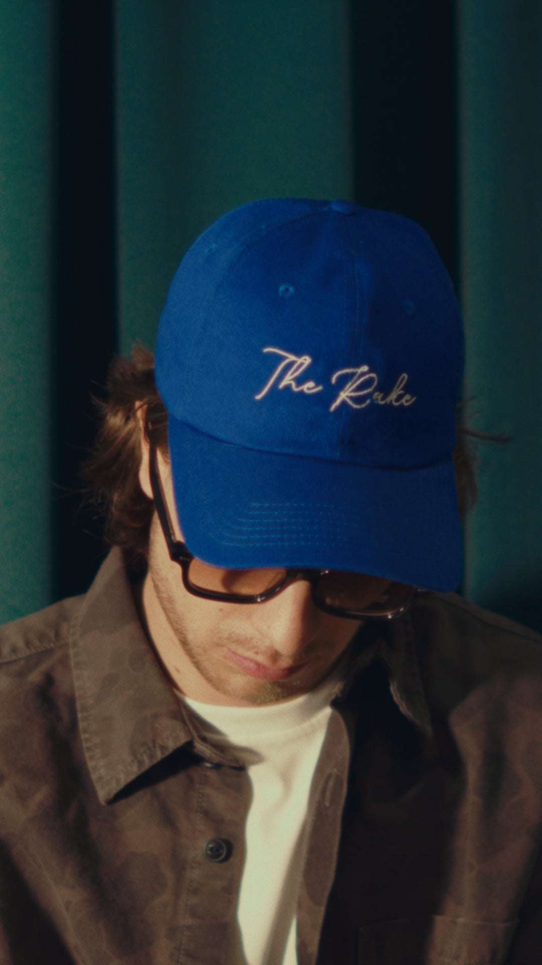 Mens wardrobe essentials including shirts, knits, t-shirts, pants, socks, and underwear laid out neatly