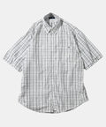 Checkered shirt on a light gray background