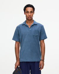 OAS Terry Polo Shirt in navy blue with palm tree embroidery, short sleeves, made from 100% knitted terry cotton.