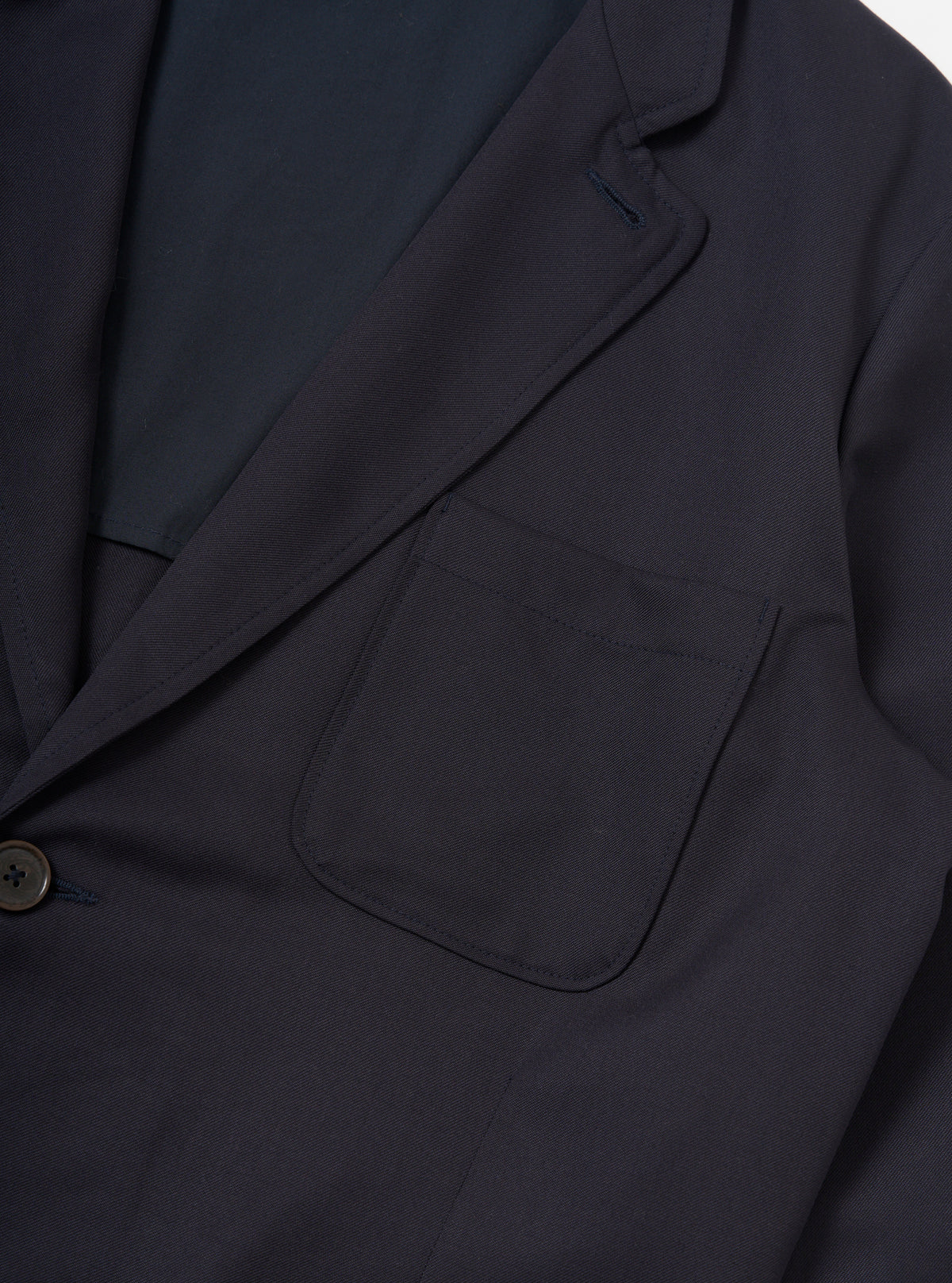 Universal Works Travel Suiting Two Button Jacket in Navy