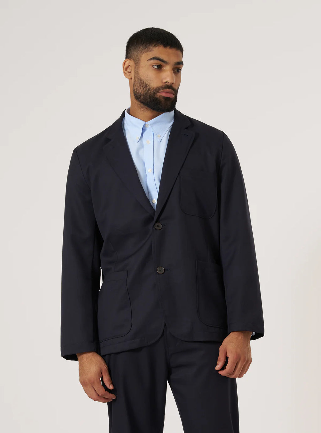 Universal Works Travel Suiting Two Button Jacket in Navy