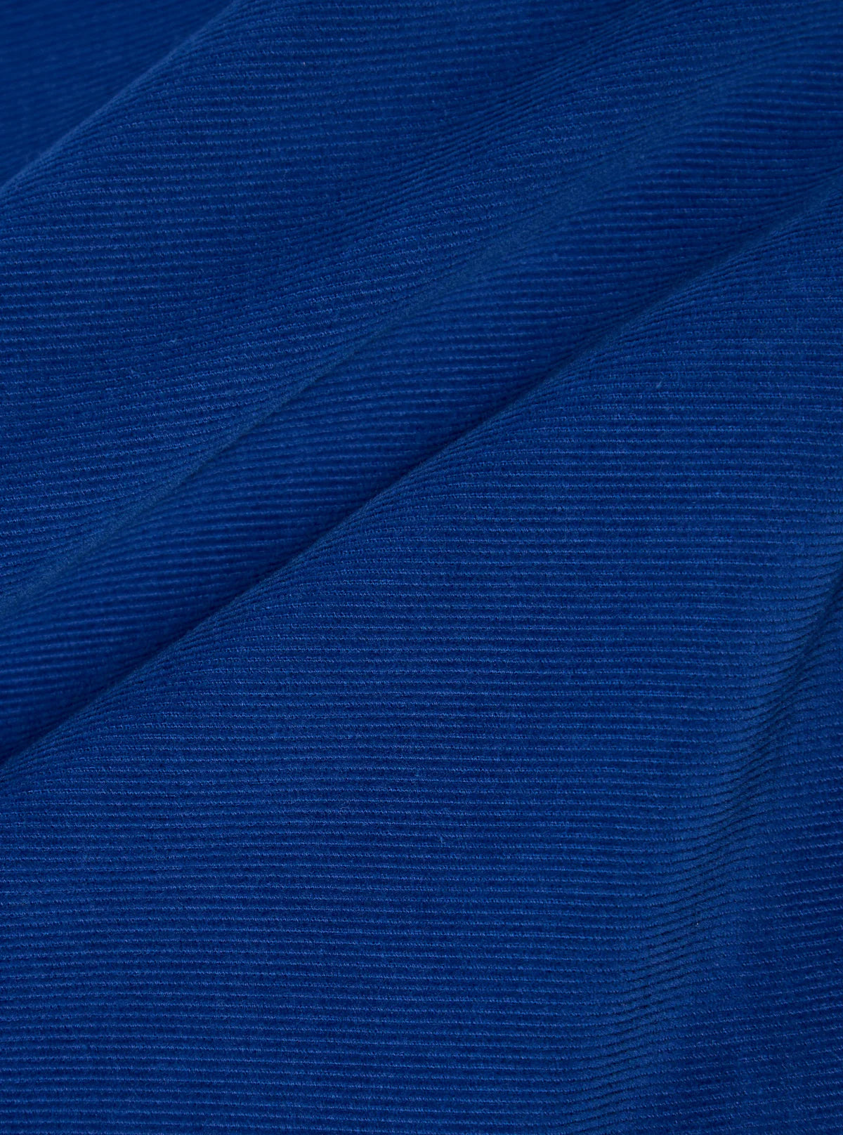 Universal Works Fine Cord Bakers Overshirt in Blue