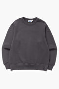 Power Goods Loopback Crewneck sweatshirt in washed black organic cotton with elastic cuffs and crewneck design