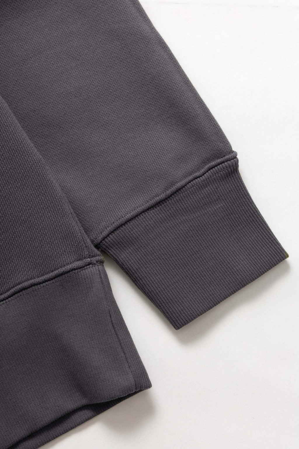 Power Goods Loopback Crewneck in Washed Black made from 500gsm organic cotton with loopback fabric and elasticated cuffs