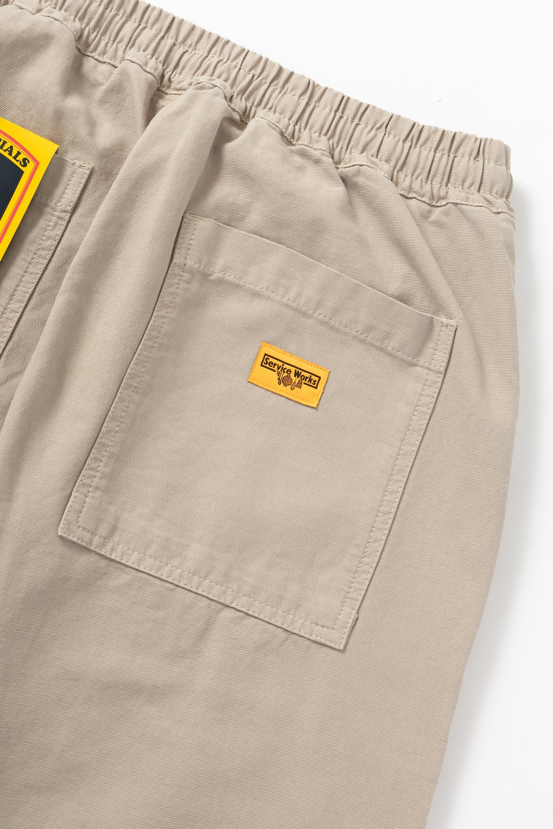 Service Works Classic Chef Pants in stone color made from organic cotton canvas with elastic waist and fatigue-style pockets