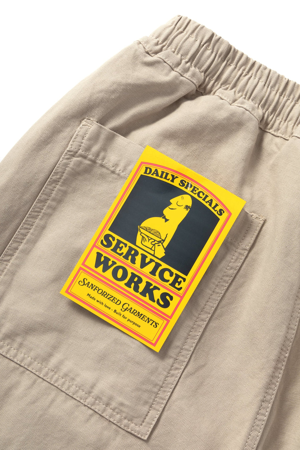 Service Works Classic Chef Pants in stone color made from organic cotton canvas with elastic waist and fatigue pockets