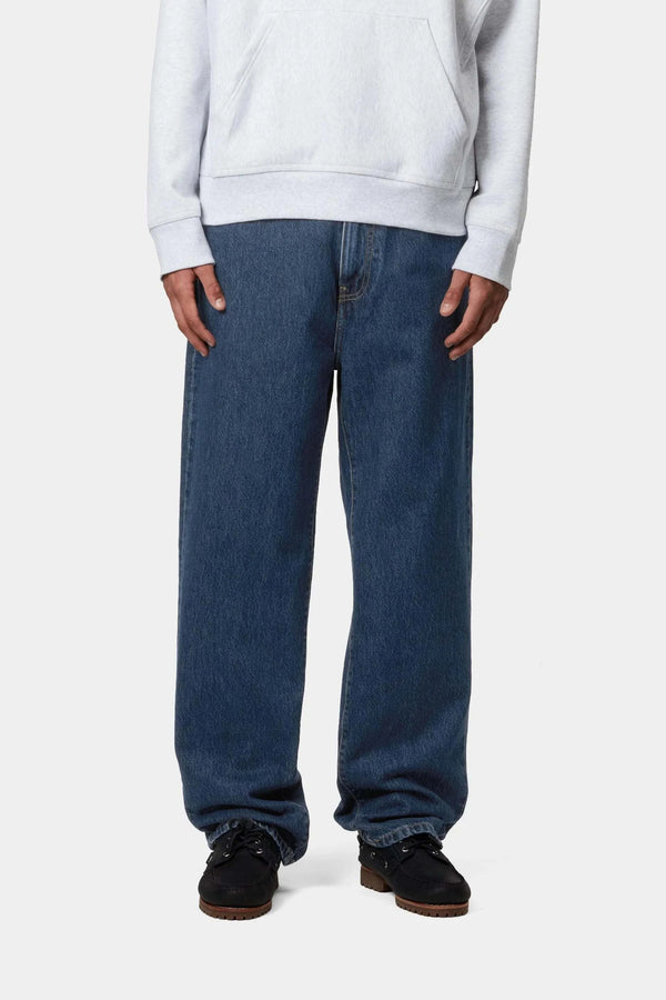 Carhartt WIP Aaron Pant in blue stone wash five-pocket tapered denim jeans with leather label