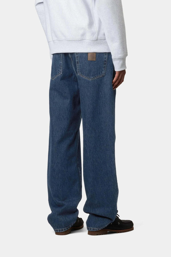 Carhartt WIP Aaron Pant blue stone wash tapered denim jeans with five pockets and rear leather label