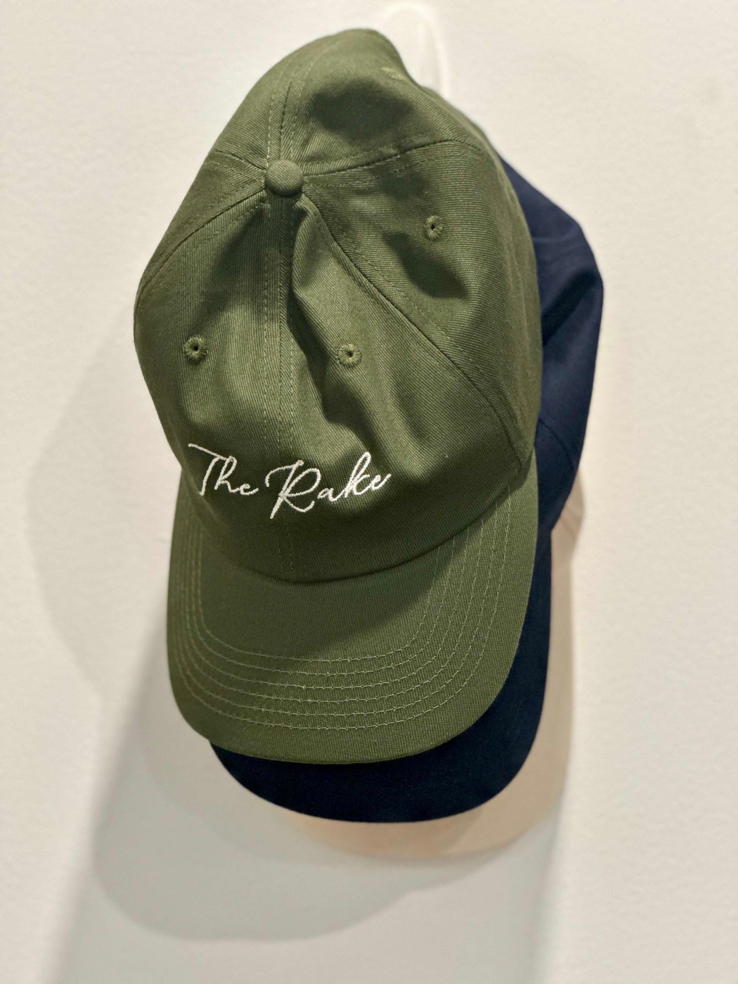 The Rake Logo Dad Cap in Forest Green