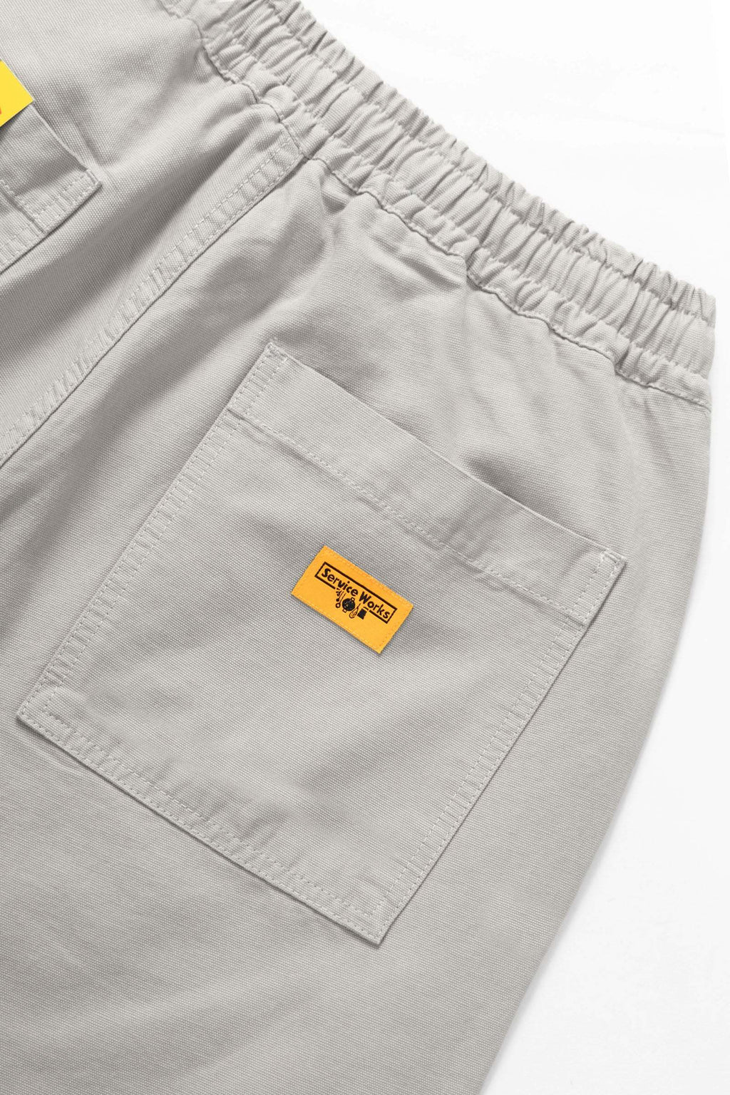 Service Works Classic Chef Shorts in stone color with elasticated waist and fatigue pockets made from organic cotton canvas