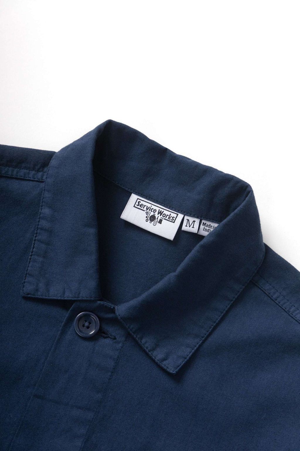 Service Works Canvas Chore Shirt in dark navy organic cotton canvas with patch pockets and button front closure