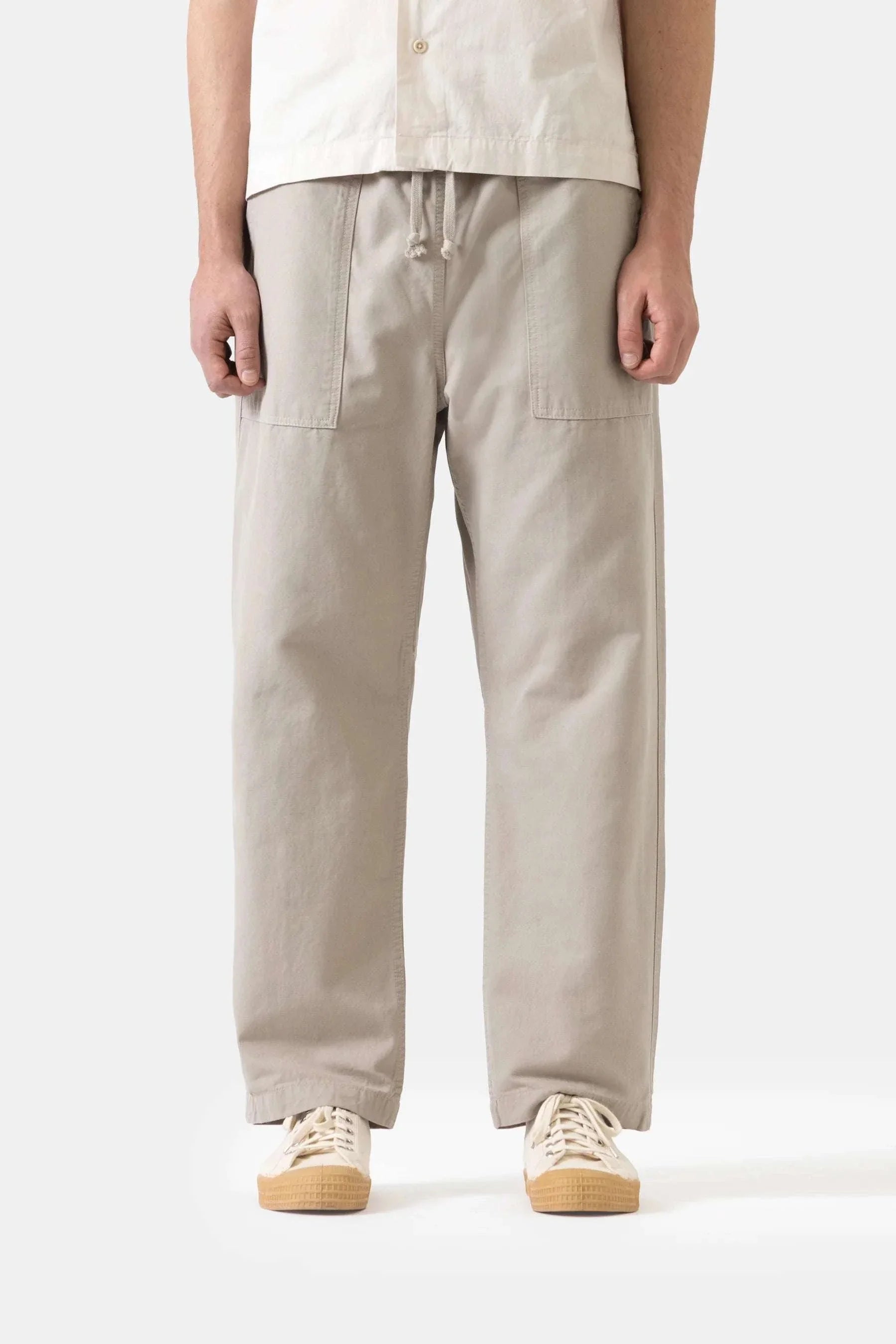 Service Works Classic Chef Pants in stone color made from organic cotton canvas with elasticated waist and fatigue-style pockets